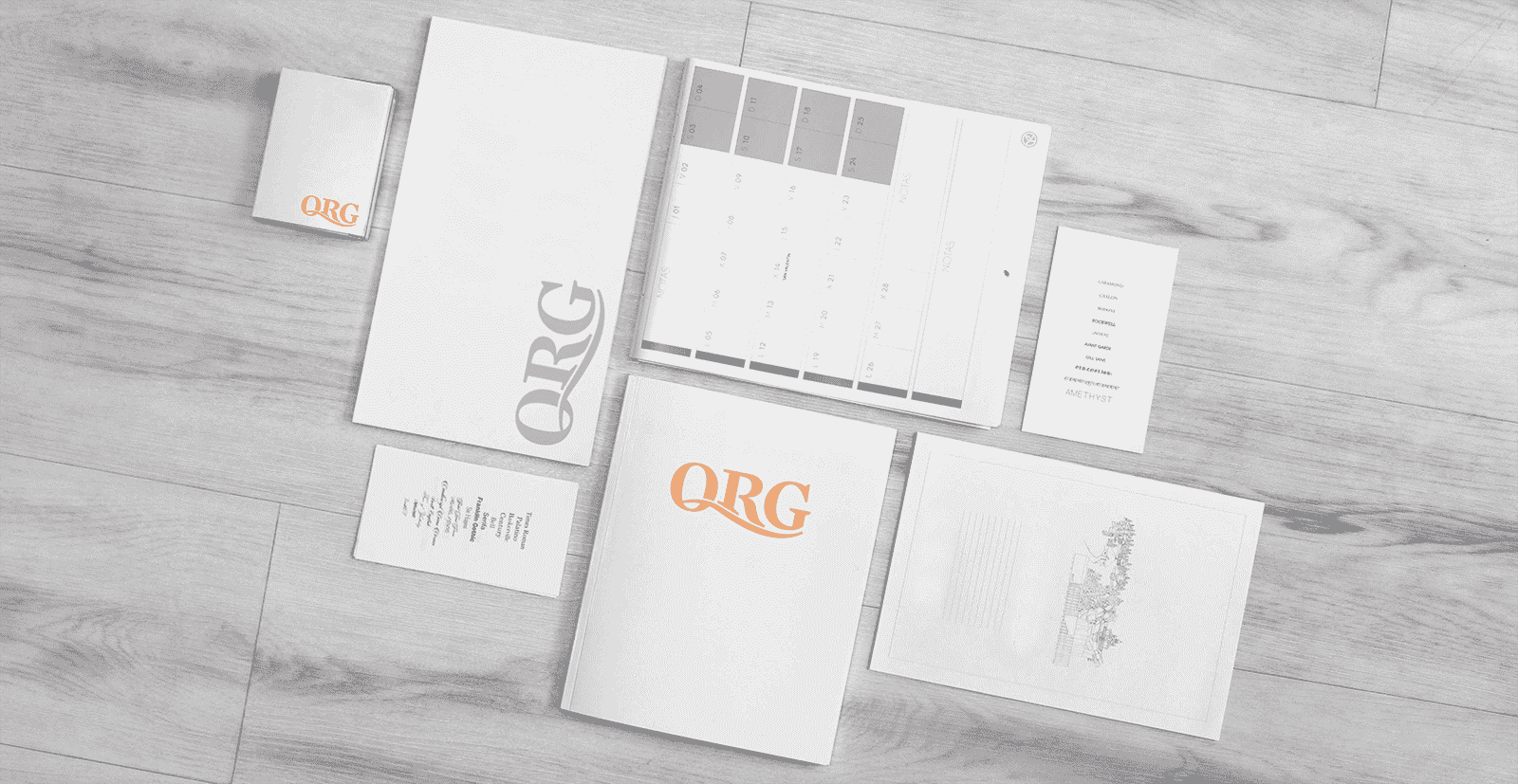 a group of print materials on a table