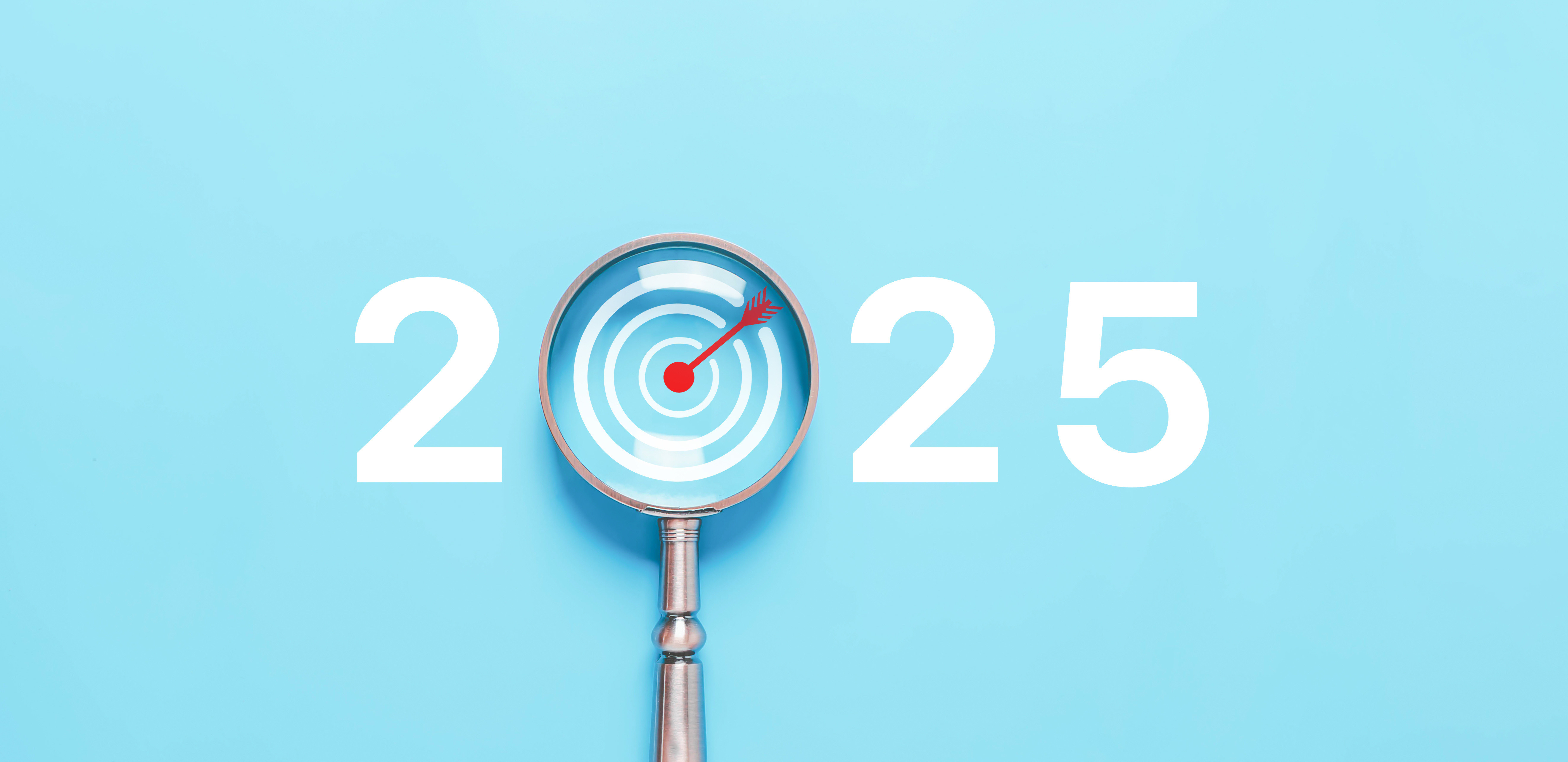 a light blue background with 2025 shown in white including a magnifying glass instrument focused on the zero, with a red arrow in the middle - Top Marketing Trends for 2025 blog cover image